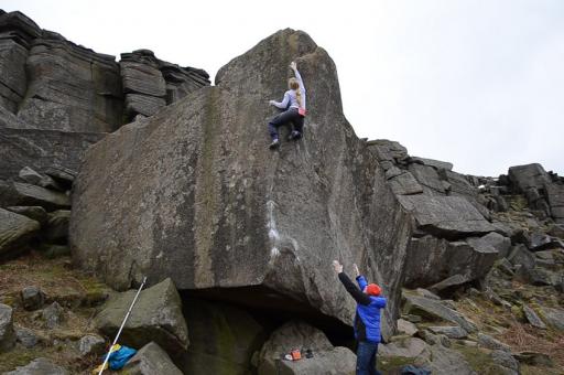 Mina Leslie Wujastyk making the first female ascent of Careless Torque 8A at Stanage ukclimbing